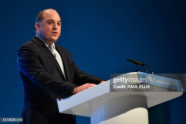 Britain's Defence Secretary Ben Wallace delivers a speech on the first day of the annual Conservative Party conference at the Manchester Central...