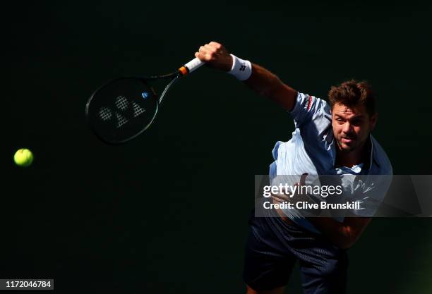 Stan Wawrinka of Switzerland serves during his Men's Singles quarterfinal match against Daniil Medvedev of Russia on day Nine of the 2019 US Open at...