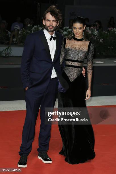 Rossif Sutherland and Laysla De Oliveira walk the red carpet ahead of the "Guest of Honour" screening during the 76th Venice Film Festival at Sala...