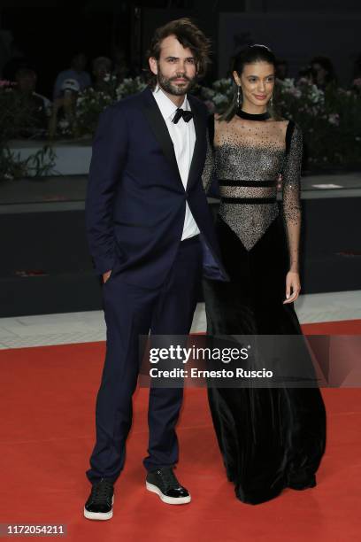 Rossif Sutherland and Laysla De Oliveira walk the red carpet ahead of the "Guest of Honour" screening during the 76th Venice Film Festival at Sala...