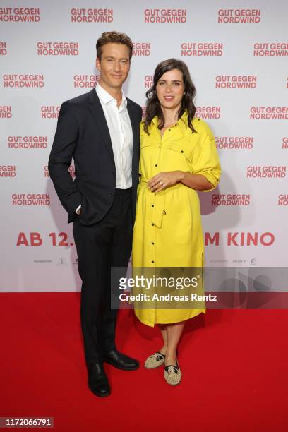 Alexander Fehling and Nora Tschirner attend the world premiere of the movie "Gut gegen Nordwind" at Cinedom on September 03, 2019 in Cologne, Germany.