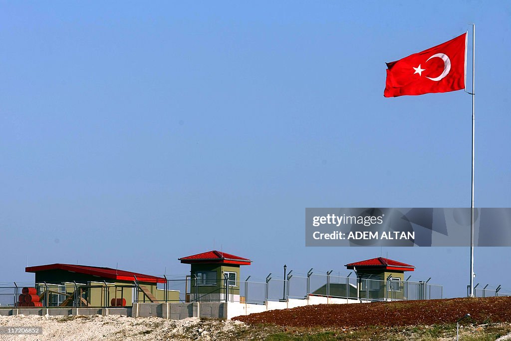 The Turkish flag flies at a border post