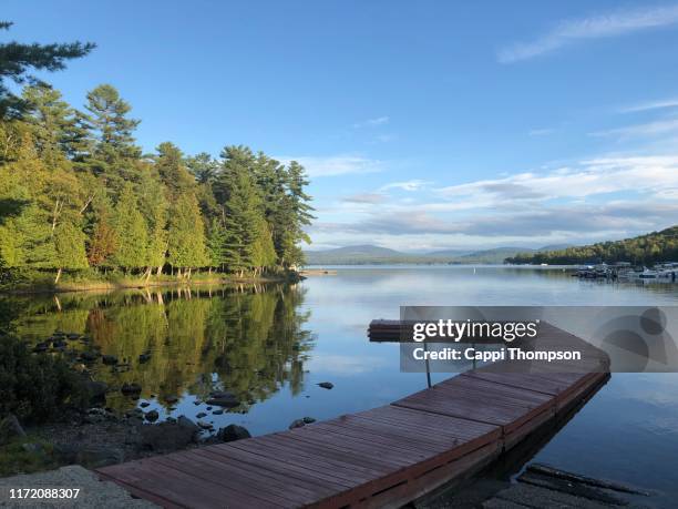 pier or boat dock at lake mooselookmeguntic in rangeley, maine usa - mooselookmeguntic lake fotografías e imágenes de stock