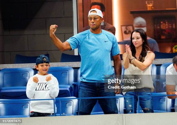 Charlie Axel Woods, Tiger Woods and Erica Herman are seen at The 2019 US Open Tennis Championships on September 03, 2019 in New York City.