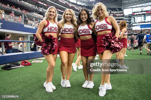 Arkansas Razorbacks Cheer Arkansas Razorbacks cheerleaders pose for a picture during the game ...