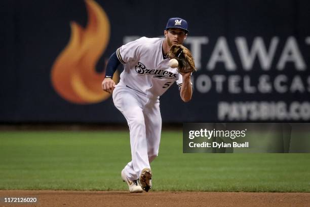 Cory Spangenberg of the Milwaukee Brewers fields a ground ball in the fourth inning against the Houston Astros at Miller Park on September 03, 2019...