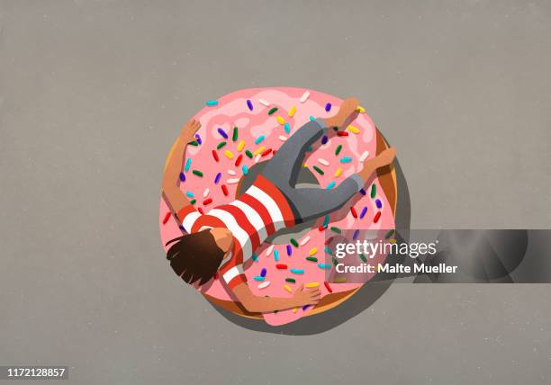 girl relaxing on large donut with sprinkles - child eating stock illustrations