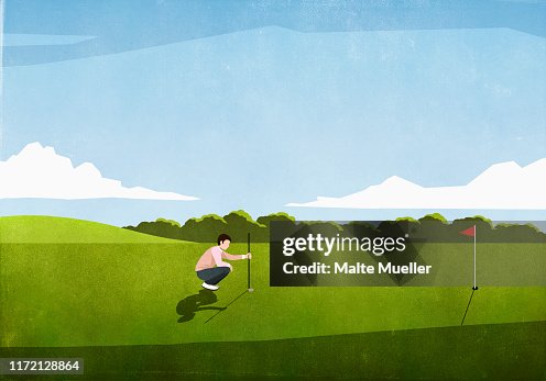 Male golfer preparing tee shot on sunny golf course Male golfer preparing tee shot on sunny golf course