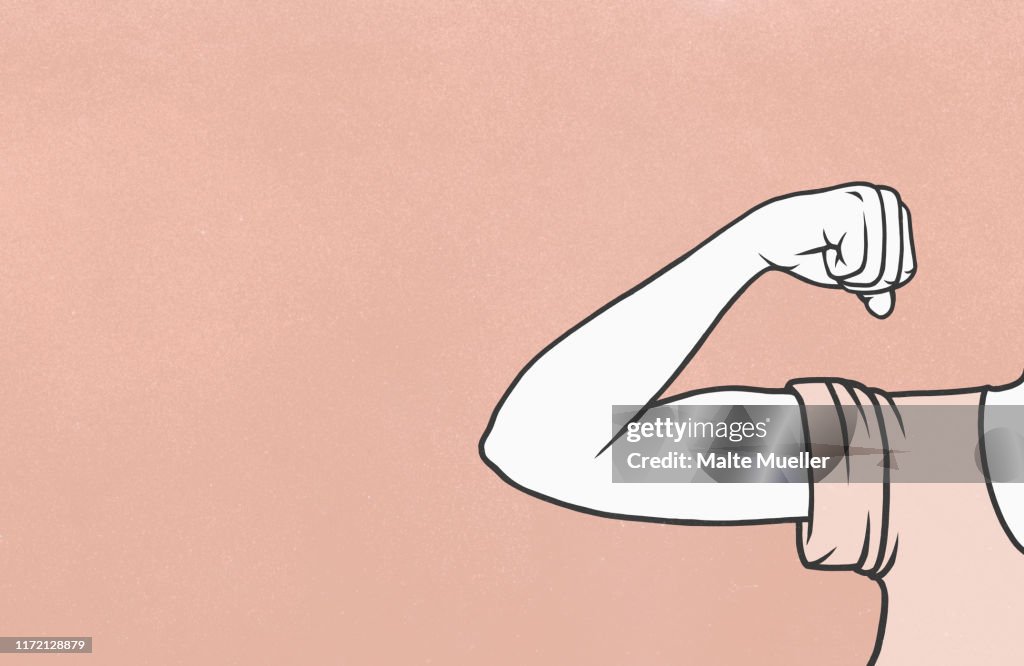 Woman flexing biceps muscle