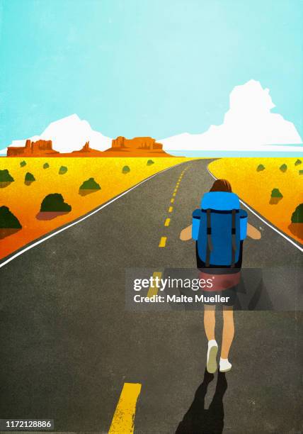 female backpacker walking on remote, arid desert road - natural rock formation stock illustrations