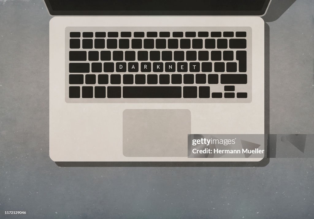 Darknet text on laptop keyboard
