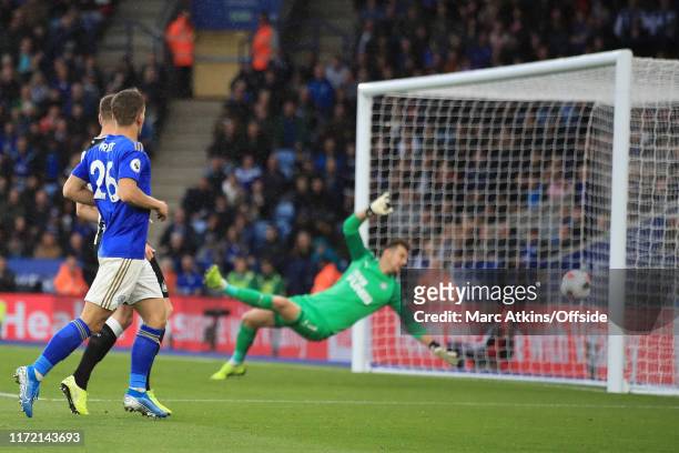 Dennis Praet of Leicester City score their 3rd goal via a deflection from Paul Dummett of Newcastle United during the Premier League match between...