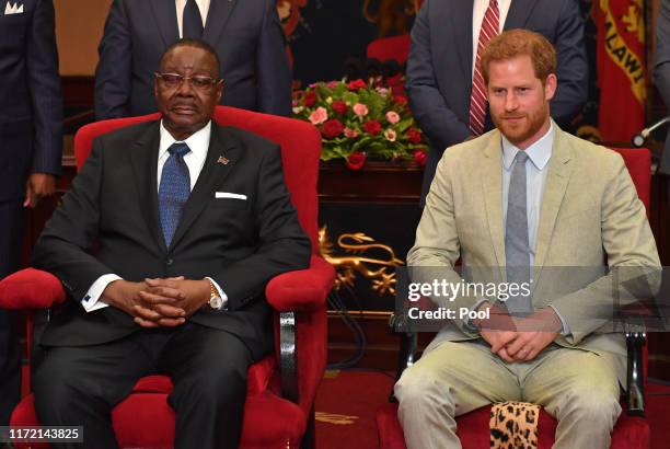 Prince Harry, Duke of Sussex meets with Professor Arthur Peter Mutharika, President of the Republic of Malawi at the State House on day seven of the...