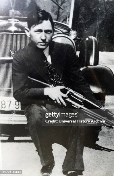 Photograph of Clyde Barrow. Clyde Chestnut Barrow an American criminal who travelled around the Central United States with Bonnie Parker and their...