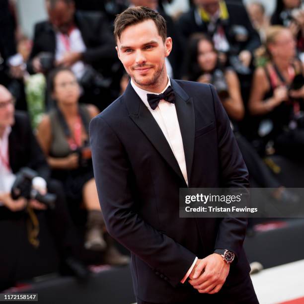 Nicholas Hoult wearing a Jaeger-LeCoultre watch walks the red carpet ahead of the Opening Ceremony and the "La Vérité" screening during the 76th...