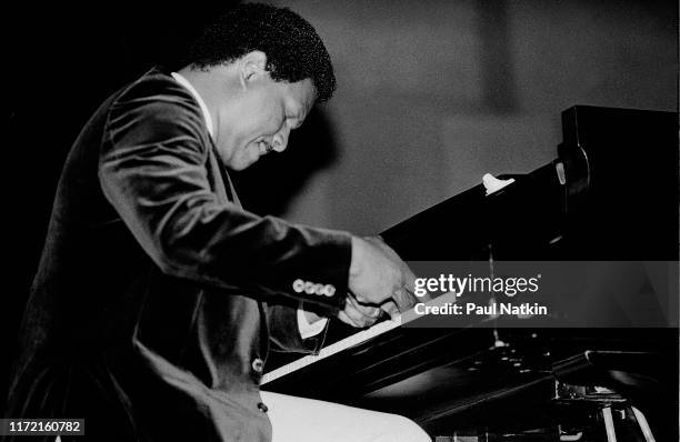 American jazz musician McCoy Tyner performs on stage at the Petrillo Bandshell in Chicago, Illinois, September 4 1982.