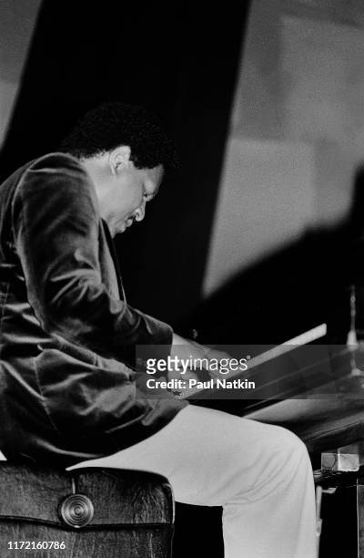 American jazz musician McCoy Tyner performs on stage at the Petrillo Bandshell in Chicago, Illinois, September 4 1982.
