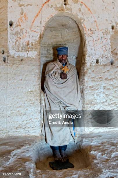 Ethiopia, Tigray Region, Gheralta Mountain: Orthodox priest of the rupestrian Church of Abuna Yemata Guh.