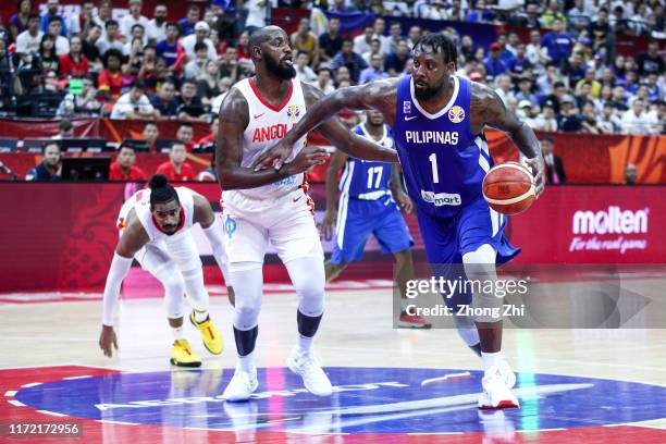 Andray Blatche of the Philippines National Team in action against Valdelicio Joaquim of the Angola National Team during the 1st round of 2019 FIBA...