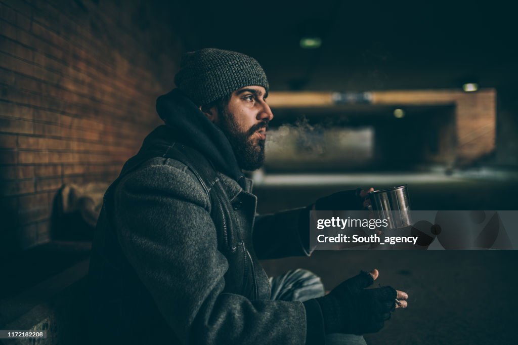 Homeless Guy Begging High-Res Stock Photo - Getty Images