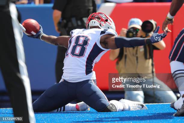 Matthew Slater of the New England Patriots celebrates a touchdown after a blocked punt during the first half against the Buffalo Bills at New Era...