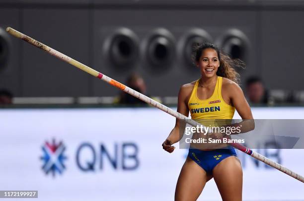 Doha , Qatar - 29 September 2019; Angelica Bengtsson of Sweden after clearing 4.80m using a pole vaulting pole borrowed from Ninon Guillon-Romarin of...