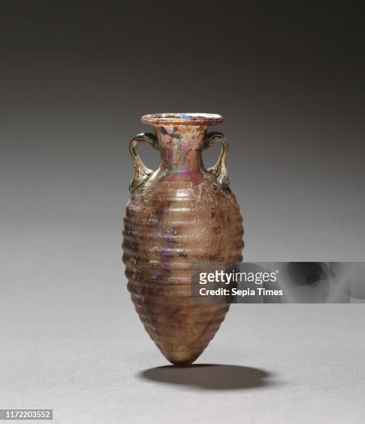 Amphora, 50-100. Italy, Rome or Sidonia, Roman, 2nd half 1st Century. Glass; diameter: 2.5 cm ; overall: 7.5 x 3.5 cm .