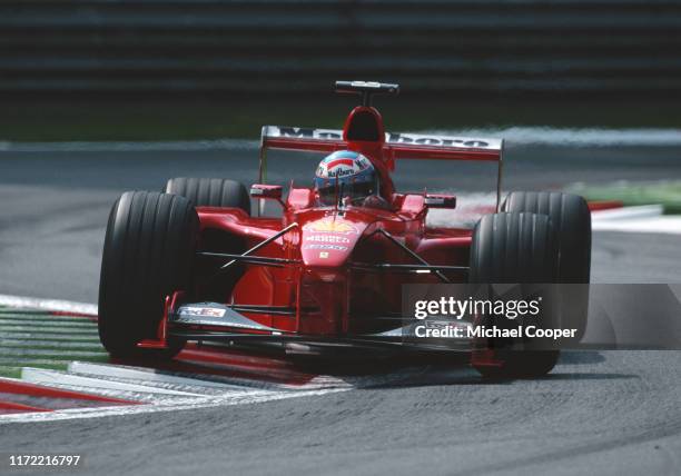 Mika Salo of Finland drives the Scuderia Ferrari Marlboro Ferrari F399 during the Italian Grand Prix on 12th September 1999 at the Autodromo...