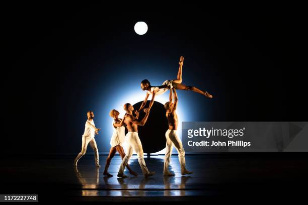 Cast members perform during the "Alvin Ailey American Dance Theater" photocall at Sadlers Wells Theatre on September 04, 2019 in London, England.
