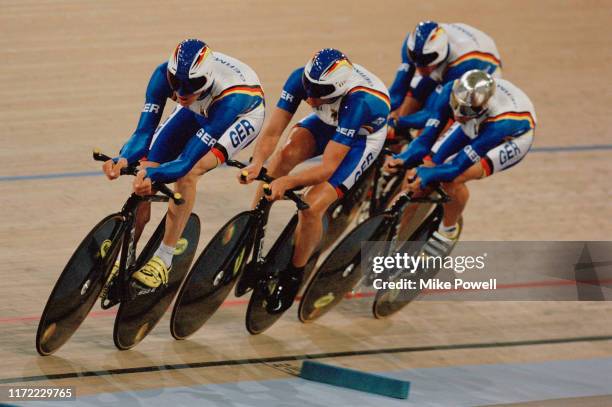 Guido Fulst, Robert Bartko,Daniel Becke and Jens Lehmann of Germany cycling to the gold medal in the Men's Team Pursuit on 18th September 2000 during...
