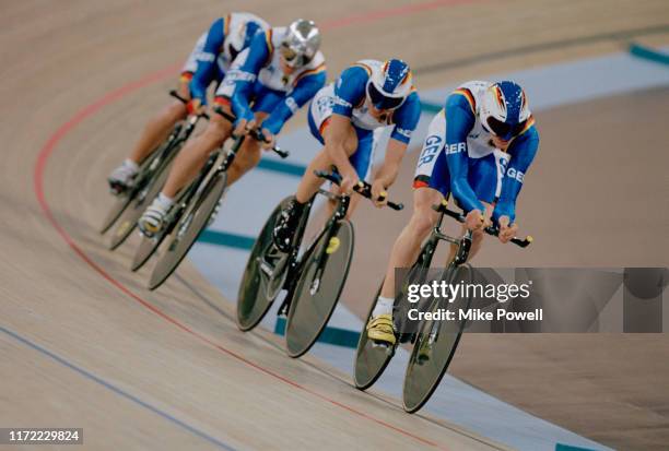 Guido Fulst, Robert Bartko,Daniel Becke and Jens Lehmann of Germany cycling to the gold medal in the Men's Team Pursuit on 18th September 2000 during...