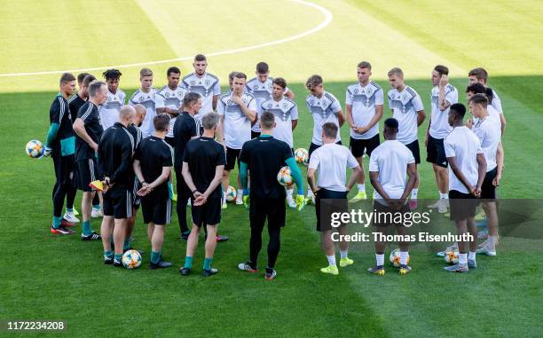 Head coach Stefan Kuntz of Germany stays together with his team during the Germany Under 21 Training Session at Stadion Zwickau on September 04, 2019...