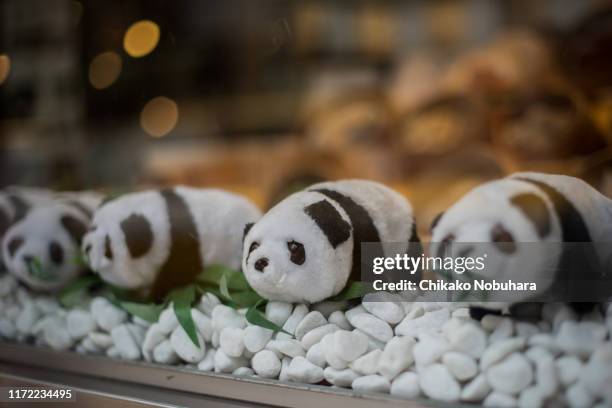 panda! panda! panda! - yokohama chinatown stock pictures, royalty-free photos & images