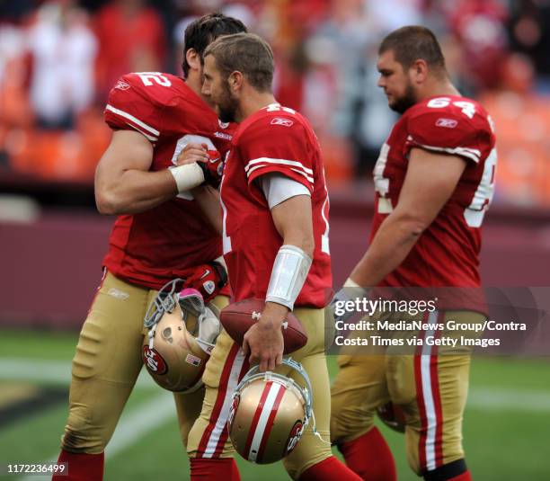 San Francisco 49ers quarterback Alex Smith is congratulated by his teammate Nate Byham after defeating the Oakland Raiders on Sunday, Oct. 17 at...