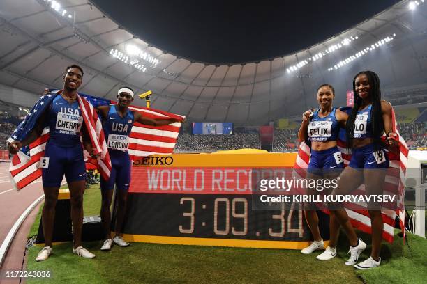S Michael Cherry, USA's Wilbert London, USA's Allyson Felix and USA's Courtney Okolo react after setting a world record in the Mixed 4 x 400m Relay...