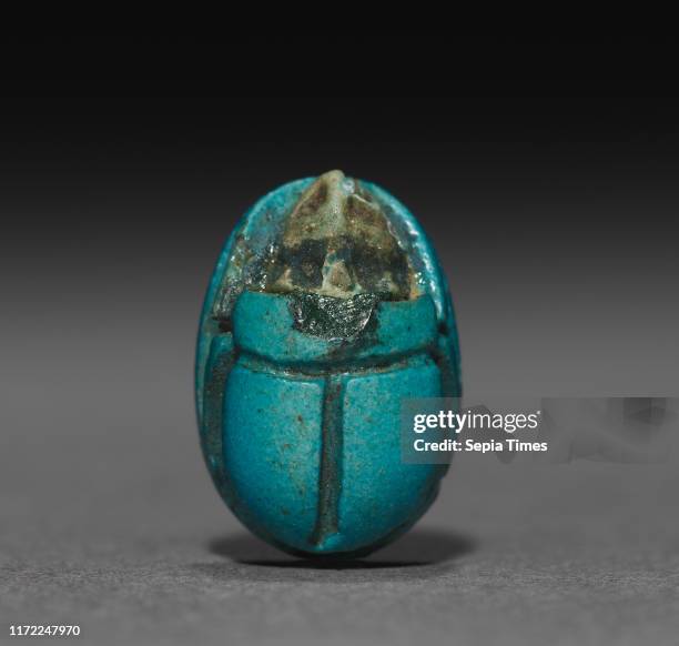 Scarab, 1350-1296 BC. Egypt, New Kingdom, mid-Dynasty 18 . Turquoise faience; overall: 1 cm .