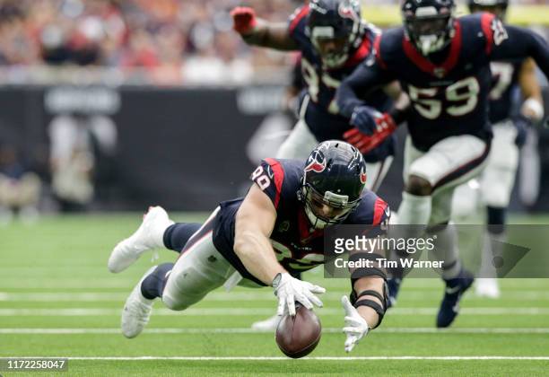 Watt of the Houston Texans recovers a fumble by Kyle Allen of the Carolina Panthers in the third quarter at NRG Stadium on September 29, 2019 in...