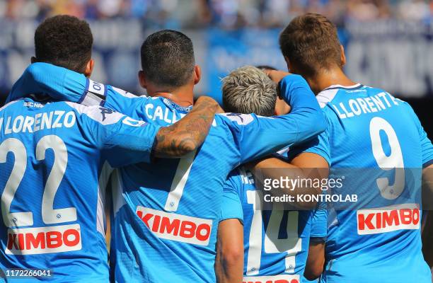 Napoli's belgian striker Dries Mertens celebrates with teammates after scoring a goal during the Italian Serie A football match SSC Napoli vs Brescia...