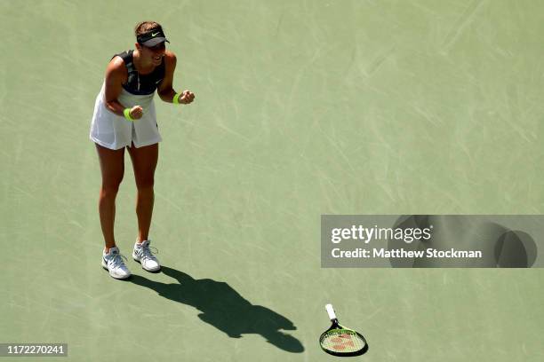 Belinda Bencic of Switzerland celebrates after winning her Women's Singles quarterfinal match against Donna Vekic of Croatia on day ten of the 2019...