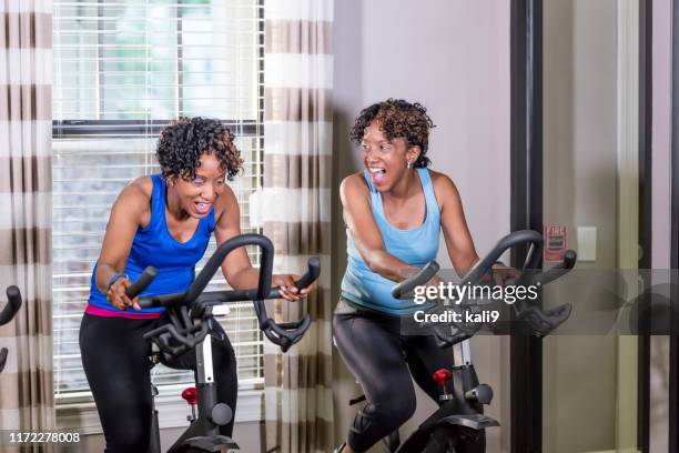 identical twins working out at the gym - identical twin stock pictures, royalty-free photos & images
