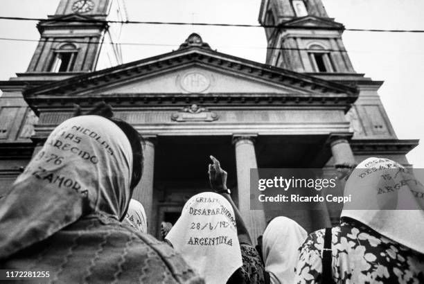 Mothers of Plaza de Mayo protest in front of the Parish Santa Rosa de Lima where the priest accused of torturing Christian Von Wernich preaches on...