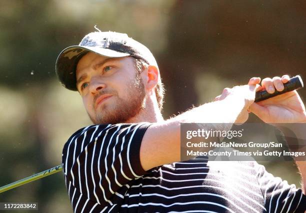 Ron lewis/staff 2.9.06 san mateo county times&#10;&#13;Teen idol Justin Timberlake tees off the 10th hole at Poppy Hills golf course during opening...