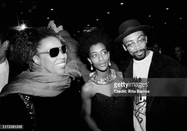 From left, American singer Roberta Flack and siblings, actress Joie Lee and film director Spike Lee, pose together at the Criterion cinema during the...