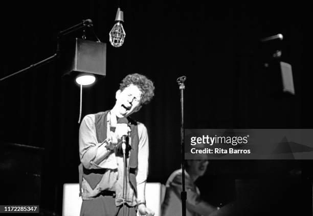 American singer and musician Tom Waits performs on stage at the Eugene O'Neill Theatre , New York, New York, October 16, 1987.