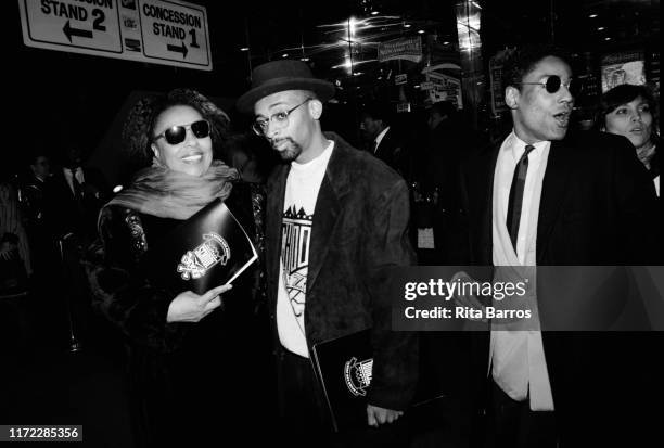 American singer Roberta Flack and film director Spike Lee pose together, beside actor Giancarlo Esposito, at the Criterion cinema during the preview...
