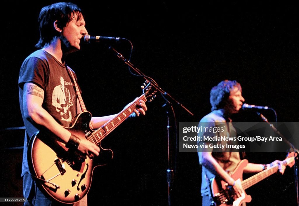Elliott Smith (left) and his band play at San Francisco's Filmore Theatre Monday, March 1, 1999.&#13;