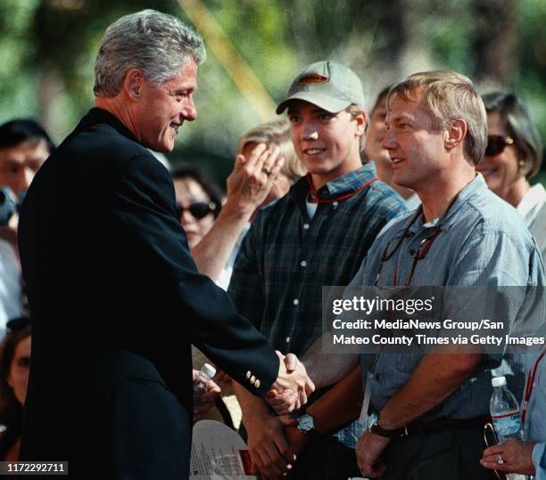 Stanford, CA September 19, 1997: President Bill Clinton greets a family that was fortunate enough to be sitting in the front row near the Clinton's...
