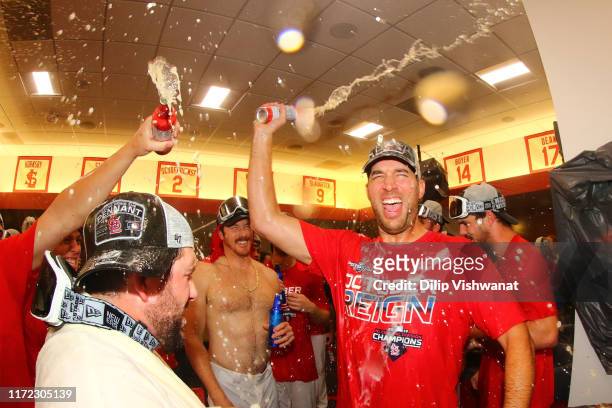 Adam Wainwright of the St. Louis Cardinals celebrates winning the National League Central Division after beating the Chicago Cubsat Busch Stadium on...