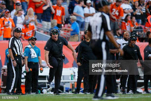 Head coach Doug Marrone of the Jacksonville Jaguars complains about a low hit to his quarterback during the fourth quarter against the Denver Broncos...