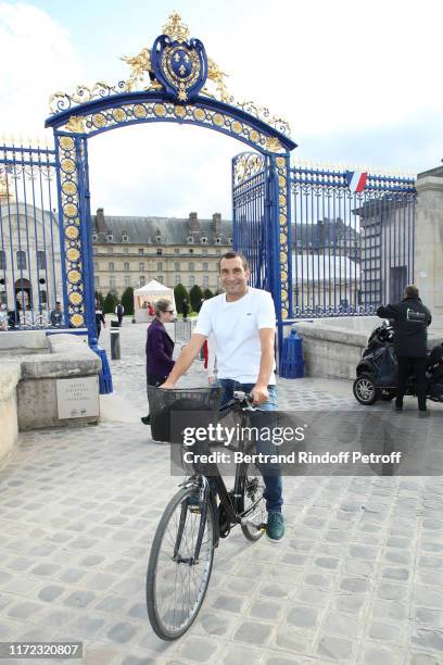 Actor Zinedine Soualem attends the "Tosca - Opera en Plein Air" performance at Les Invalides on September 04, 2019 in Paris, France.